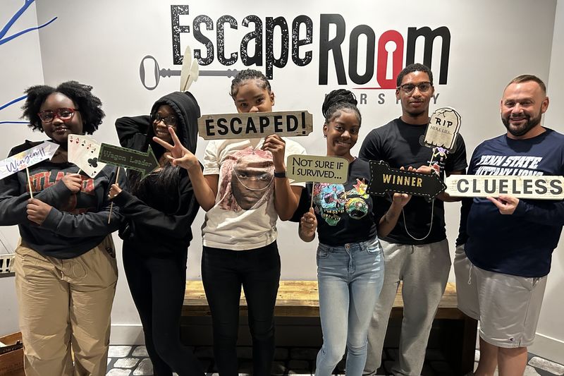 group photo at an escape room 