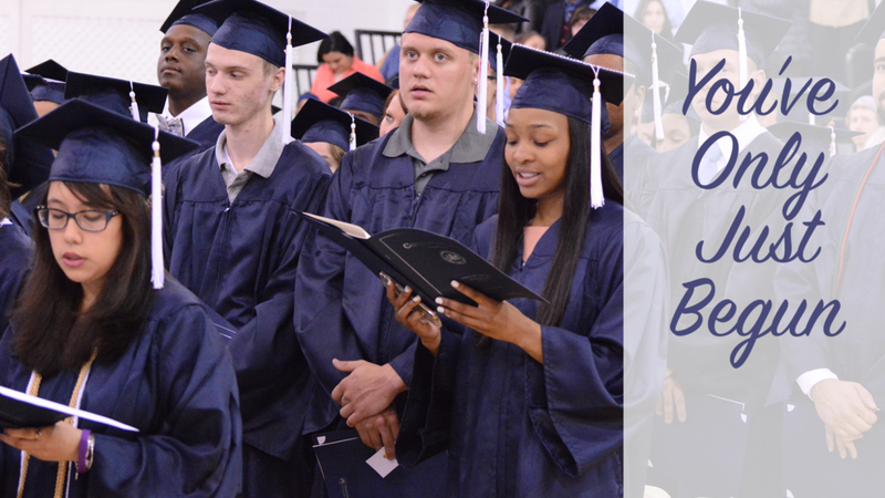 group of Penn State Schuylkill graduates sing National Anthem