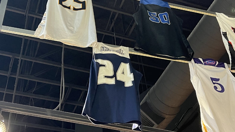 Women's basketball jersey hanging from rafters in Women's Basketball Hall of Fame