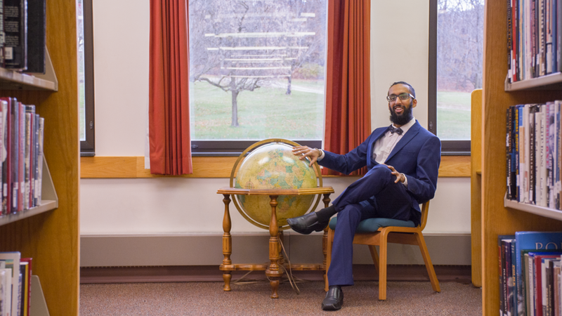 Harnoor Singh, former Schuylkill student, sits in the library.