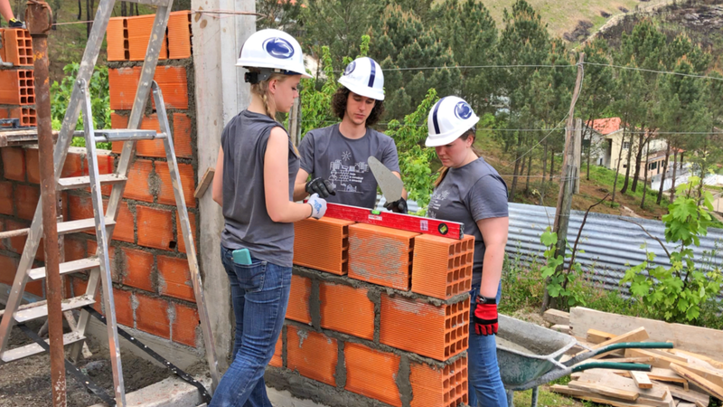 Marla, Ian, and Alyssa at Habitat for Humanity Portugal build site