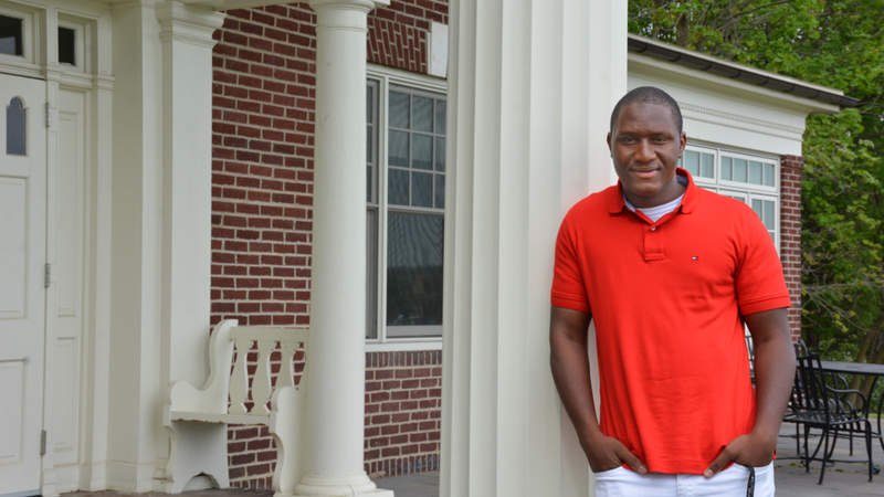 Harunah Barry, class of 2017, stands in front of Kiefer-Jones buildig on Schuylkill's campus.