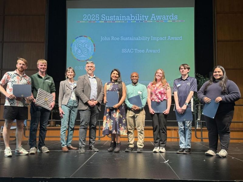 A group of people at an awards ceremony