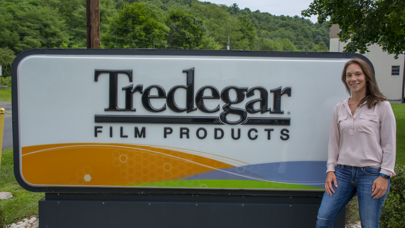 Catherine Holm, a senior in the business program at Penn State Schuylkill, stands outside Tredegar, a plastic film manufacturer where she interns.