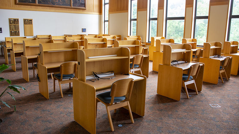 Several rows of study carrels stretched across a wide space