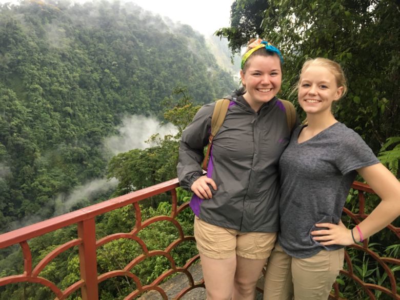 Students Alyssa and Marla take in a breathtaking overlook in Costa Rica.