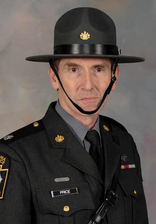 A headshot of Price in his Pennsylvania State Police dress uniform.
