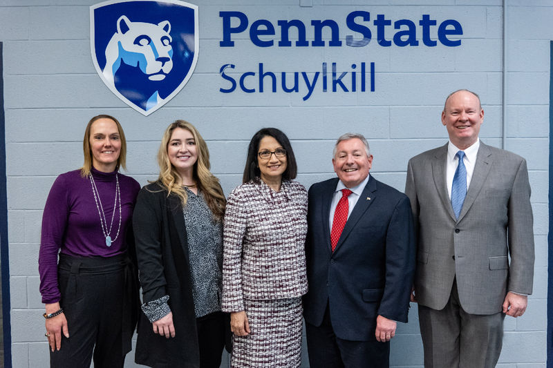 Staff from the Schuylkill Chamber of Commerce and Penn State Schuylkill pose with Penn State President Neeli Bendapudi