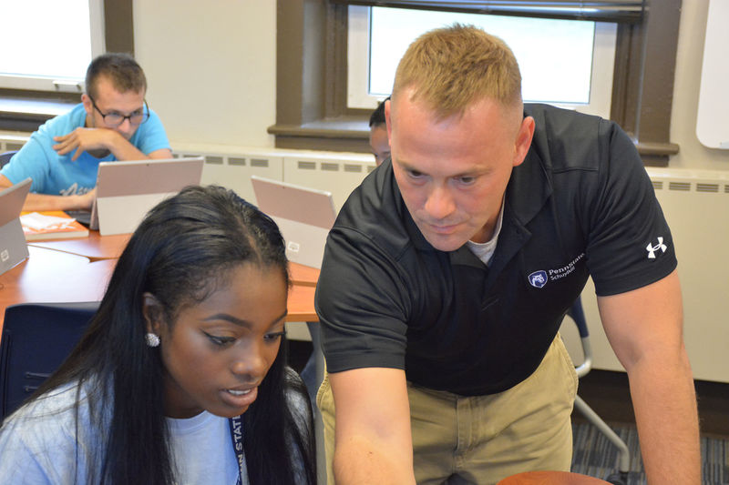 CSP faculty mentor advises a student during her first-year seminar class