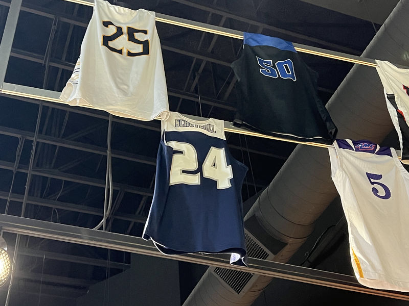 Women's basketball jersey hanging from rafters in Women's Basketball Hall of Fame