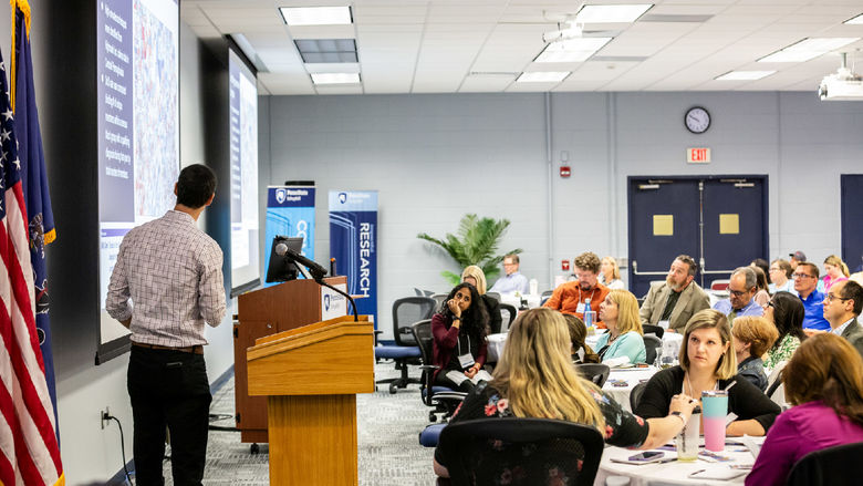 Dr. Danny George presents to the audience at CTSI's Community-Driven Research Day
