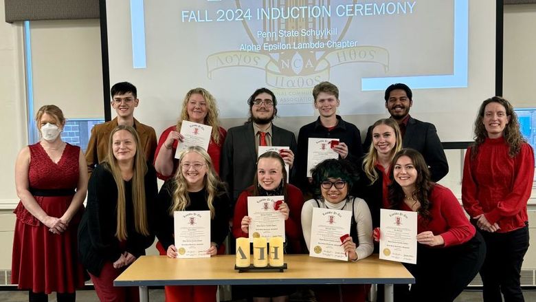 Eight new members inducted into Lambda Pi Eta