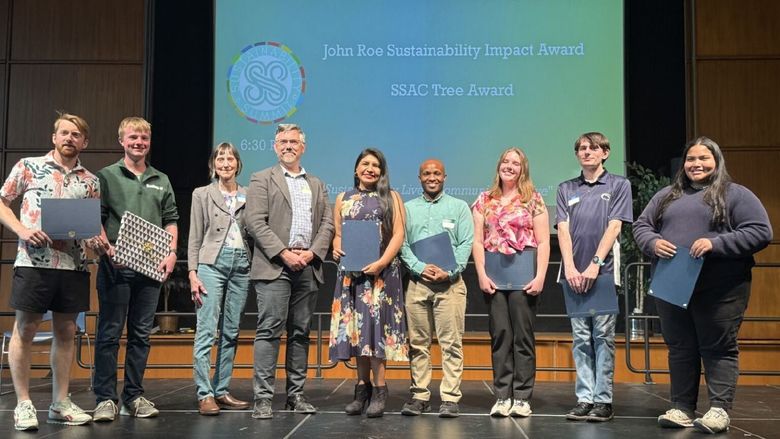 A group of people at an awards ceremony