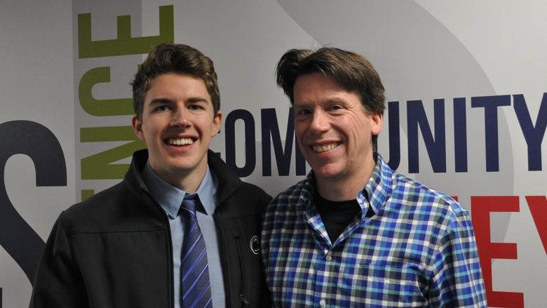 Student Joshua Cobler posed with his Division of Undergraduate Education adviser, Jeff Gugino