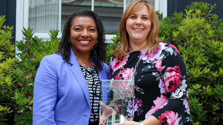 Lorraine Goffe, left, vice president for human resources and chief human resources officer at Penn State, presented Valerie Henne-Hallman with the 2019 Ray T. Fortunato Award for Excellence in Human Resources.