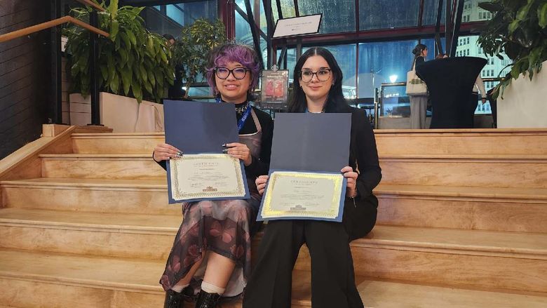 Two students receive awards