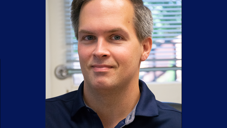 Headshot image of Cory Scherer