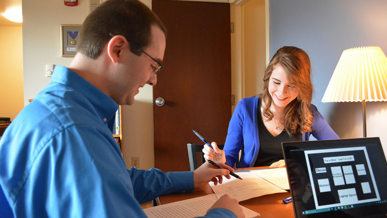Honors students Heather and Josh prepare for their conference