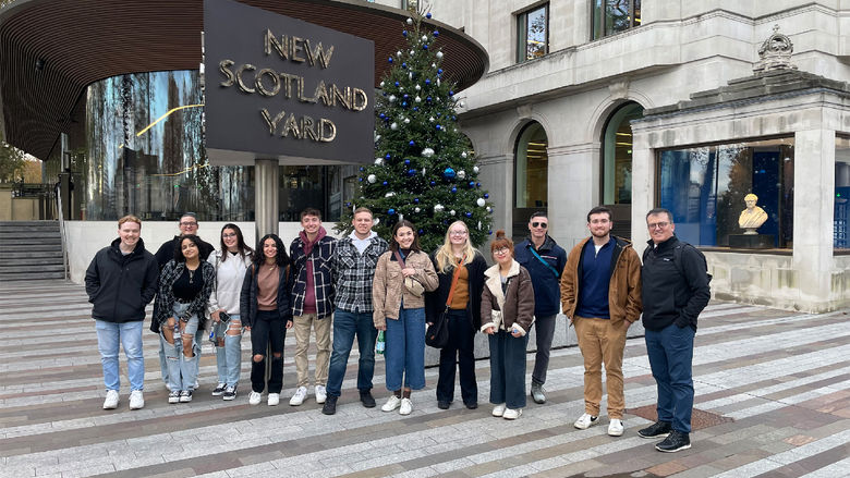 Students of the course CRIMJ 499 Serial Killers and European Criminal Justice next to New Scotland Yard.