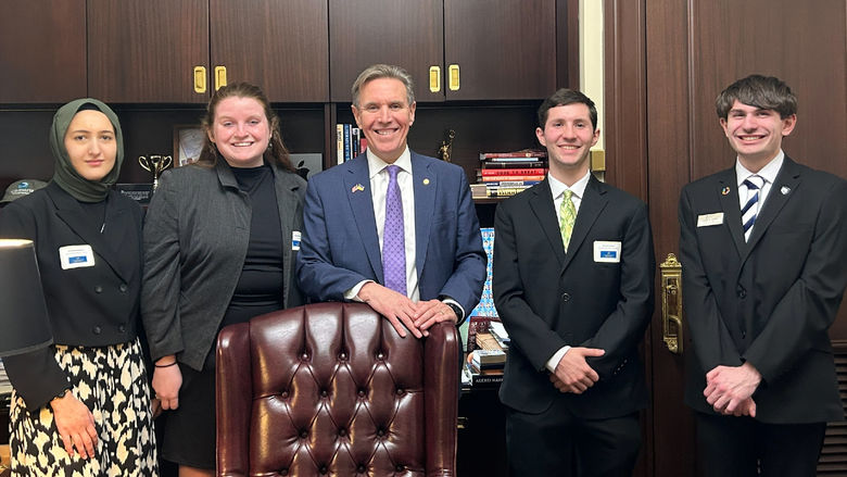 Penn State students with Takac