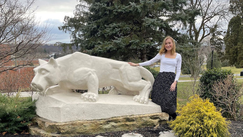 Outdoor photograph of Tara Laubenstine at the Lion Shrine