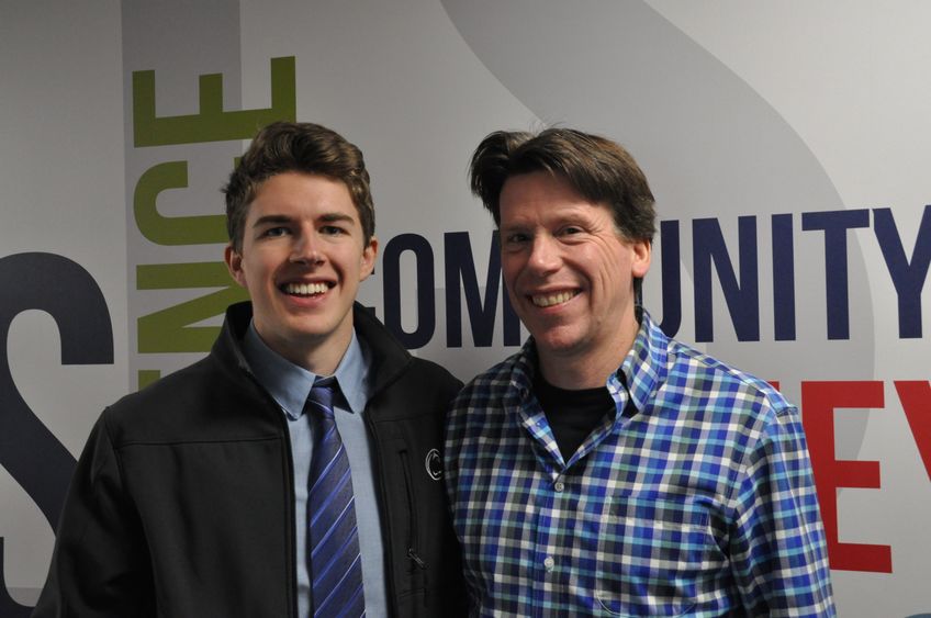 Student Joshua Cobler posed with his Division of Undergraduate Education adviser, Jeff Gugino