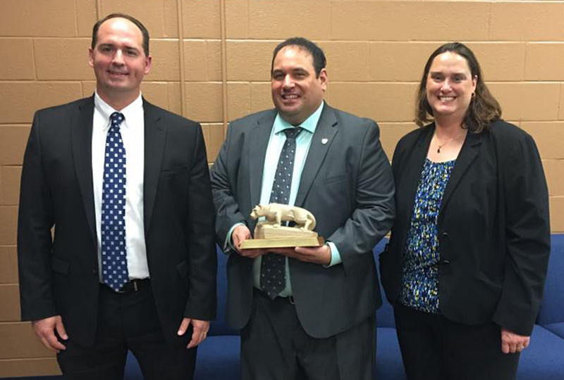 Jonathan Kukta (center) was recently honored with Penn State Schuylkill's Outstanding Alumnus Award. Jonathan Kukta (center) was recently honored with Penn State Schuylkill's Outstanding Alumnus Award.