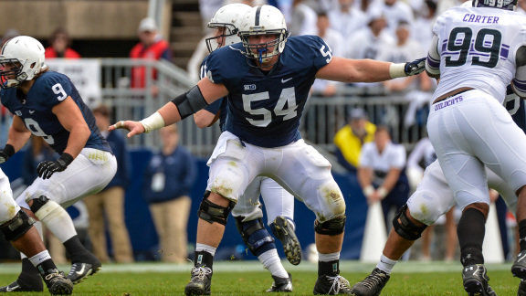 Penn State football center Matt Stankiewitch blocks against Northwestern