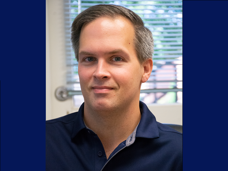 Headshot image of Cory Scherer