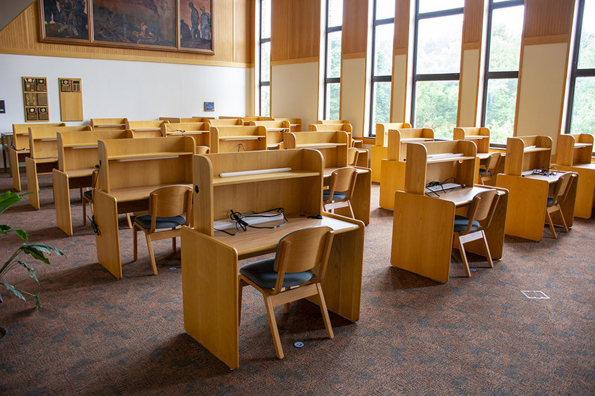 Several rows of study carrels stretched across a wide space